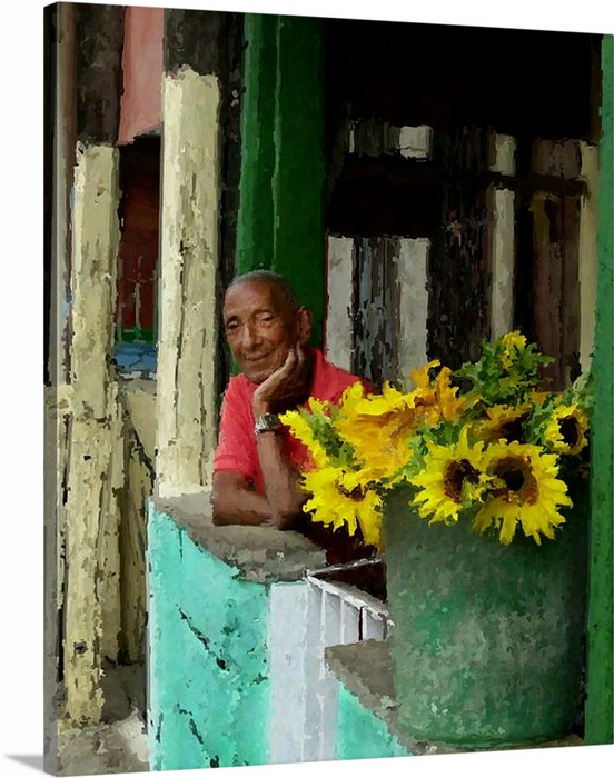 Man selling sunflowers from stand